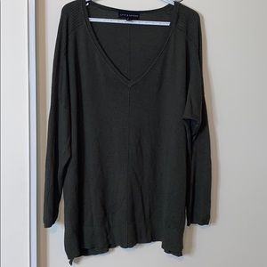 Plus size green sweater.